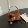 Bolsa Feminina Shuai Mi Jia de Bolinhas com Laço 2026 Outono Nova Moda Elegante Bolsa de Ombro Transversal Bolsa de Mão Fofa de Nicho