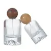 En Stock 30ml 50ml 100ml Botella de Perfume Fondo Volcánico, Botella Vacía Recargable, Botella Transparente Cilíndrica de Fondo Grueso con Atomizador