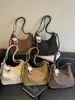 Bolsas de nicho Shuai Mi Jia, bolsa feminina de grande capacidade, mochila modelo 2026 novo, bolsa de ombro tote casual fashion