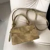 Bolso de diseño de nicho nuevo 2026, bolso cruzado moderno y texturizado, bolso versátil para mujer retro y simple, moderno