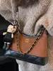 Bolso cubo único con patrón de diamantes para mujer, nuevo otoño 2026, moda vintage de alta gama, para hombro, cruzado y de mano