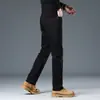Jeans elásticos de ajuste slim de marca de alta gama en color negro para hombre, nuevo modelo otoño 2026, lavables y que no destiñen, jeans de pierna recta para hombre
