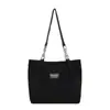 Bolso de mujer 2026 otoño nuevo estilo coreano mochila escolar para estudiante bolso de hombro simple y moderno bolso tote de gran capacidad para ir al trabajo