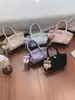 Bolsa balde tendência de nicho para carregar na mão, nova moda primavera 2026 bolsa de ombro estilo coreano, bolsa transversal de alto valor para mulheres