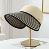 Sombrero de paja a rayas de verano transfronterizo, sombrero de ala ancha para mujer, sombrero de paja elegante para protección solar, sombrero de playa, sombrero tejido