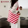 En stock nueva bolsa de tela Lixin simple elegante bolsa de compras regalo corporativo bolsa de tela para tienda de ropa personalizable