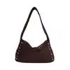 Bolso de hombro de estilo punk retro transfronterizo para mujer, nuevo modelo de verano 2026, bolso de hombro personalizado con tachuelas dulce y genial para chica popular