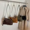 Bolsa Baguete Portátil Retro Coreana para Mulheres Inverno 2025 Nova Bolsa de Ombro Único Transversal Estilo Ocidental com Retalhos de Alta Qualidade