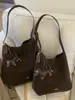 Bolso de Gran Capacidad para Mujer 2025 Nuevo Otoño e Invierno Retro Versátil Bolso Cruzado Diseño de Nicho Bolso Cubo de Hombro para Viajes