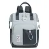 Nova bolsa de maternidade transfronteiriça, bolsa de armazenamento simples multifuncional, grande capacidade, pode ser carregada como bolsa de ombro ou bolsa de mão, mochila feminina moderna