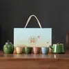 Caja de regalo para juego de té Kung Fu con patrón de hielo agrietado, juego completo de cerámica para uso doméstico con una tetera y cuatro tazas, regalo de negocios cultural y creativo de tendencia nacional
