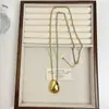 Colar com Pingente Oval em Aço Titânio Acessível de Luxo Nicho Estilo Europeu e Americano Exagerado Elegante Corrente Longa para Suéter Simples e com Senso de Sofisticação