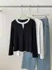 Camiseta de manga larga con efecto de dos piezas cosidas para mujer, delgada, estilo coreano, holgada y favorecedora, adecuada tanto para llevar sola como debajo de otra prenda, para principios de otoño.