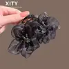 Novo prendedor de cabelo de flor em rede preta para mulheres, moderno grampo de garra com diamante brilhante para penteados altos, acessório de cabelo tipo pinça de tubarão