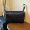 Bolso de mano de lunares versátil estilo ins, bolsa para maquillaje, bolsa de almacenamiento ligera y de gran capacidad, conveniente para viajar y fácil de llevar