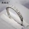 Anillo para mujer Ovilo con nueve flores pequeñas dulces, elegante y moderno, margarita dulce, sensación de alta gama, diseño de nicho de lujo ligero