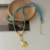 O Mesmo Estilo Popular no Xiaohongshu e Douyin: um Colar de Sorte Turquesa de Luxo Leve e Requintado com Pingente de Elefante Dourado com uma Corrente Universal Destacável
