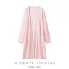 Bai Cai Rong 2026 Cardigan Caliente de Venta Larga sin Mangas de Cachemira Cuello en V Diseño Holgado y Relajado Ropa de Abrigo Elegante