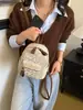 Mochila Mini de Moda Europea Transfronteriza Nueva Bolsa para Mujer de Comercio Exterior Estampado de Leopardo Flor Pequeña en la Espalda Bolsa de Viaje para Mujer