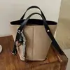 Bolsa feminina com padrão lichia 2026 nova outono alta qualidade vintage para o dia a dia bolsa de mão bolsa de ombro transversal bolsa saco
