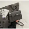 Bolso de mano de nicho de moda 2026, bolso pequeño estilo Kelly, popular entre las influencers femeninas, bolso cruzado de moda y un imprescindible para ir al trabajo este año