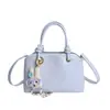Bolsa Pequena Quadrada Texturizada Estilo Japonês e Coreano para Mulheres 2026 Nova Bolsa de Ombro Transversal de Nicho Estilo Creme Bolsa Feminina Fofa