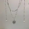 Collar de doble capa con colgante de girasol de moda y cadena de perlas Cruz Cadena para la clavícula de diseño de nicho de lujo ligero para mujer