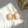 Pendientes de perlas frescas estilo coreano con un diseño único, versátiles y elegantes, pendientes de lujo ligero para mujer, venta al por mayor de joyería