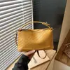 Bolsa com Textura Trançada Feminina 2026 Nova Verão Nicho Trabalho Diário Bolsa de Ombro Único Toque de Luxo Leve Retro Bolsa Transversal