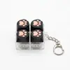 Chaveiro Botão Luminoso de Patinha de Gato Chave de Teclado Switch Tecla de Teclado Brinquedo Descompressão Pingente de Bolsa Chaveiro