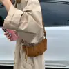 Bolsa Pequena de Camurça Retro Fosca para Axila Outono/Inverno Feminina 2025 Nova Bolsa Croissant Versátil Transversal Bolsa Bolinho