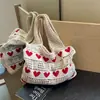 Bolsa tejida de gran capacidad calada, bolsa de compras para mujer, bolsa de punto, bolso de nuevo estilo con forma de corazón, bolsa de playa, bolso para mujer