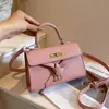 2026 Nuevo Bolso Kelly Simple Popular para Viajes Diarios, Moderno y Elegante, Bolso de Mano de Alta Gama Europeo y Americano, Bolso de Hombro y Cruzado para Mujer