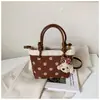 Bolso Cubo Retro Simple de Moda Bolso Casual de Moda 2026 Verano Nueva Textura Bolso de Hombro Único Cruzado para Mujer