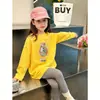 Camiseta Base de Dibujos Animados para Niñas Primavera y Otoño 2026, Nueva y Elegante Camiseta de Manga Larga Versión Coreana para Niñas