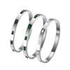 Joyería de comercio exterior transfronterizo Moda europea y americana simple para damas Acero de titanio chapado en oro pulsera a presión de diamante verde fábrica en stock