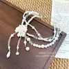 Collar de Perlas de Múltiples Capas Floral Blanco Luna de Lujo Ligero Estilo Francés con Diseño Único y Elegante Cadena para Clavícula en Estilo Inspirado en Chanel