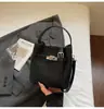 Bolso Cubo Simple y Elegante para Mujer 2026 Nuevo Bolso de Hombro Retro de Nicho Bolso Cruzado Casual para el Día a Día