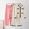 Conjunto de moda de comércio exterior transfronteiriço, novo conjunto estiloso para outono e inverno, calça de malha com botões e perna larga, conjunto de duas peças de malha