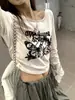 Camiseta de manga larga para mujer con estampado de letras de mariposa retro americano, otoño/invierno, moderna y elegante, con diseño desgastado y corto