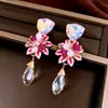 Aretes colgantes de flor con incrustaciones de diamantes y aguja de plata, moda europea y americana, aretes elegantes y de lujo ligero, aretes nuevos y elegantes al por mayor