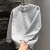 Sudadera versátil de cuello redondo para pareja, diseño simple de dos piezas falsas, color liso, diseño de nicho americano versátil, top de estilo europeo y americano