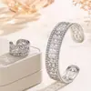 Conjunto de joyería de perlas de estilo de tribunal francés transfronterizo con pulsera y anillo calados huecos, adecuado para ir al trabajo y citas, con un toque de alta gama