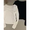Suéter de punto con cuello redondo y textura de manga larga estilo francés para mujer, nuevo modelo principios de otoño 2026, top holgado adelgazante y versátil