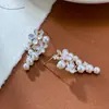 Pendientes de Borla de Perla con Pétalos Incrustados de Diamantes de Moda Sencilla para Mujer con Lujo Ligero y Diseño Único Pendientes al por Mayor