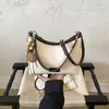 Bolsa Feminina de Axila 2026 Nova Outono Retro Moda Versátil Exquisite Commute Bolsa de Ombro Único Bolsa Saco Transversal