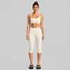 Conjunto de roupa fitness transfronteiriço, com um design traseiro estiloso, um top esportivo de gola halter e calças de yoga de secagem rápida, adequado para corrida ao ar livre, ciclismo e Pilates.