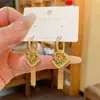 Nuevos Pendientes de Borla Larga con Gota de Esmalte Chino Pendientes de Hebilla para Mujer Lujo Ligero Vintage Multiuso Pendientes de Mariposa Pendientes de Alta Gama
