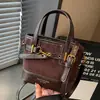 Bolsa de Mão Retrô Transfronteiriça Bolsa Feminina 2026 Nova Outono Inverno Grande Capacidade Ombro Único Transversal Simples Casual Bolsa Saco