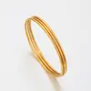 Pulseira Anel Liso Minimalista de Aço Inoxidável Xuping, Cor Dourada, Estilo Luxo Leve Europeu e Americano, Joia Empilhável de Três Camadas Atacado